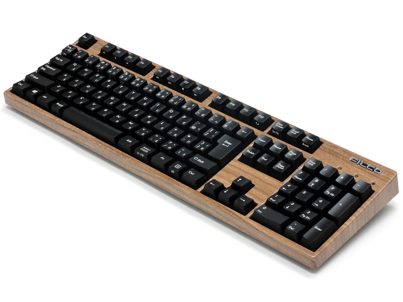 Filco Majestouch 2 with a lovely faux-wood Kobo cover.
